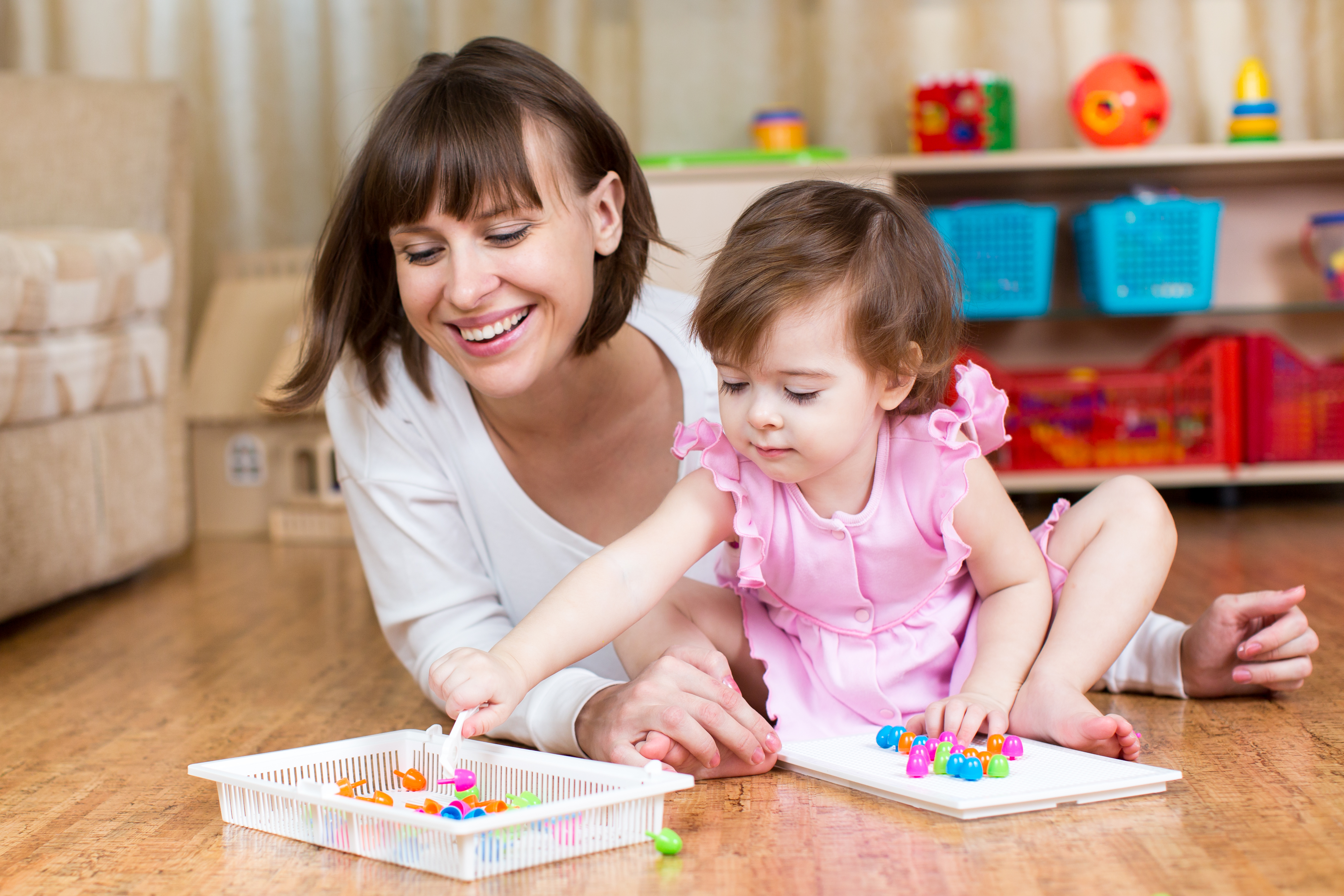 Mother and child playing together at home